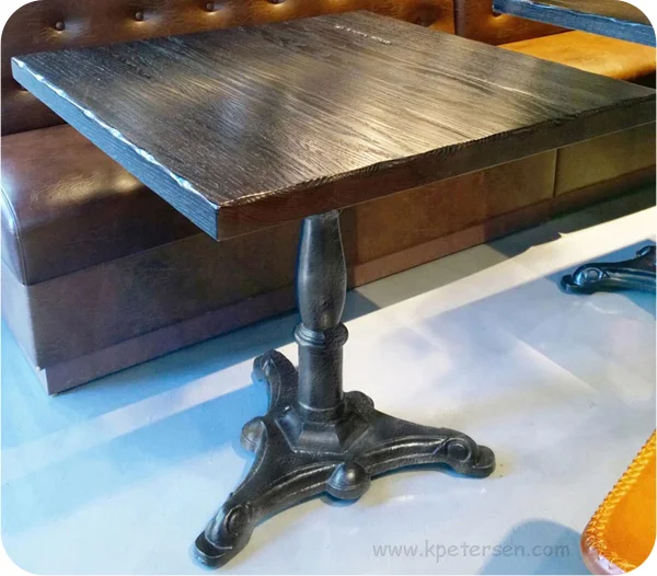 Ornate Cast Iron Saloon Table Base Installation