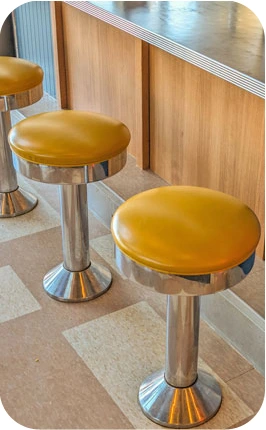 Soda Fountain Counter Stool with Smooth Round Chrome Seat Ring Installation Detail